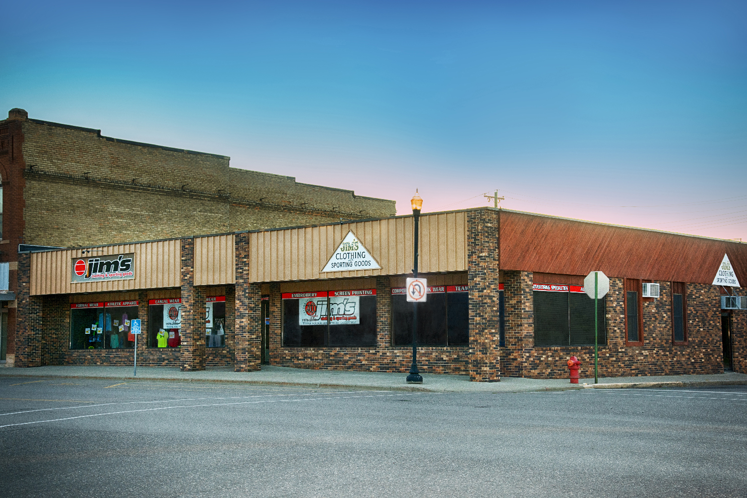 Brick Building with Jims Sign